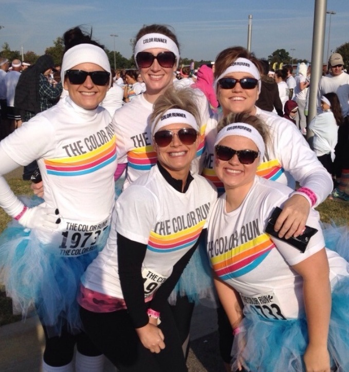 Jonesboro dental team members smiling before participating in a race