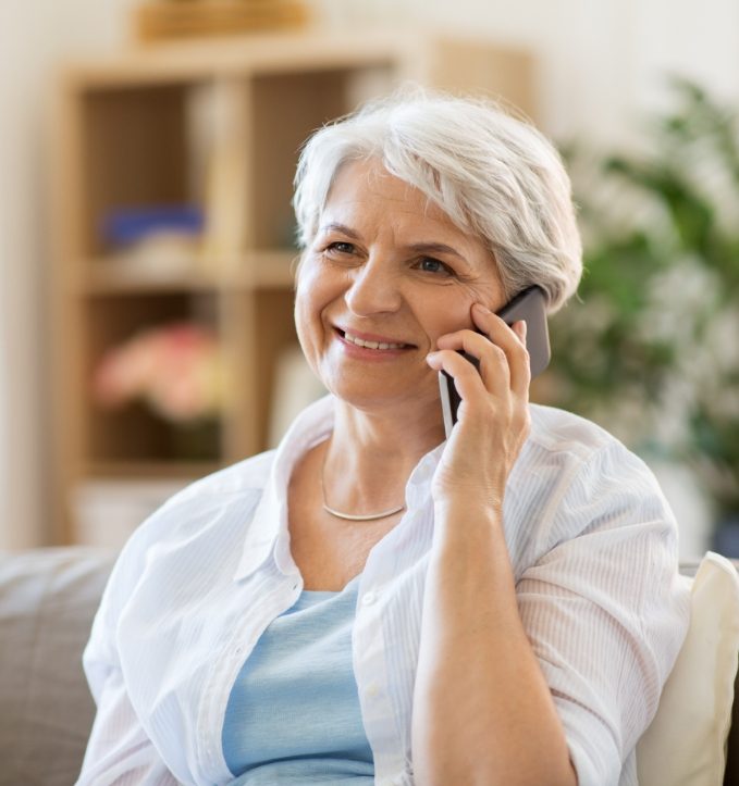 Senior woman on phone with Jonesboro dental office