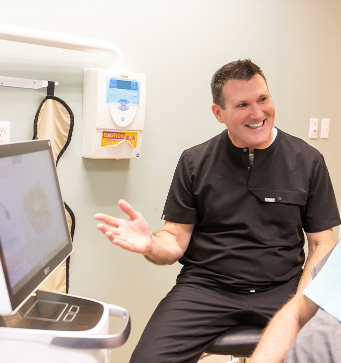 Model of mouth with two dental implants in Jonesboro