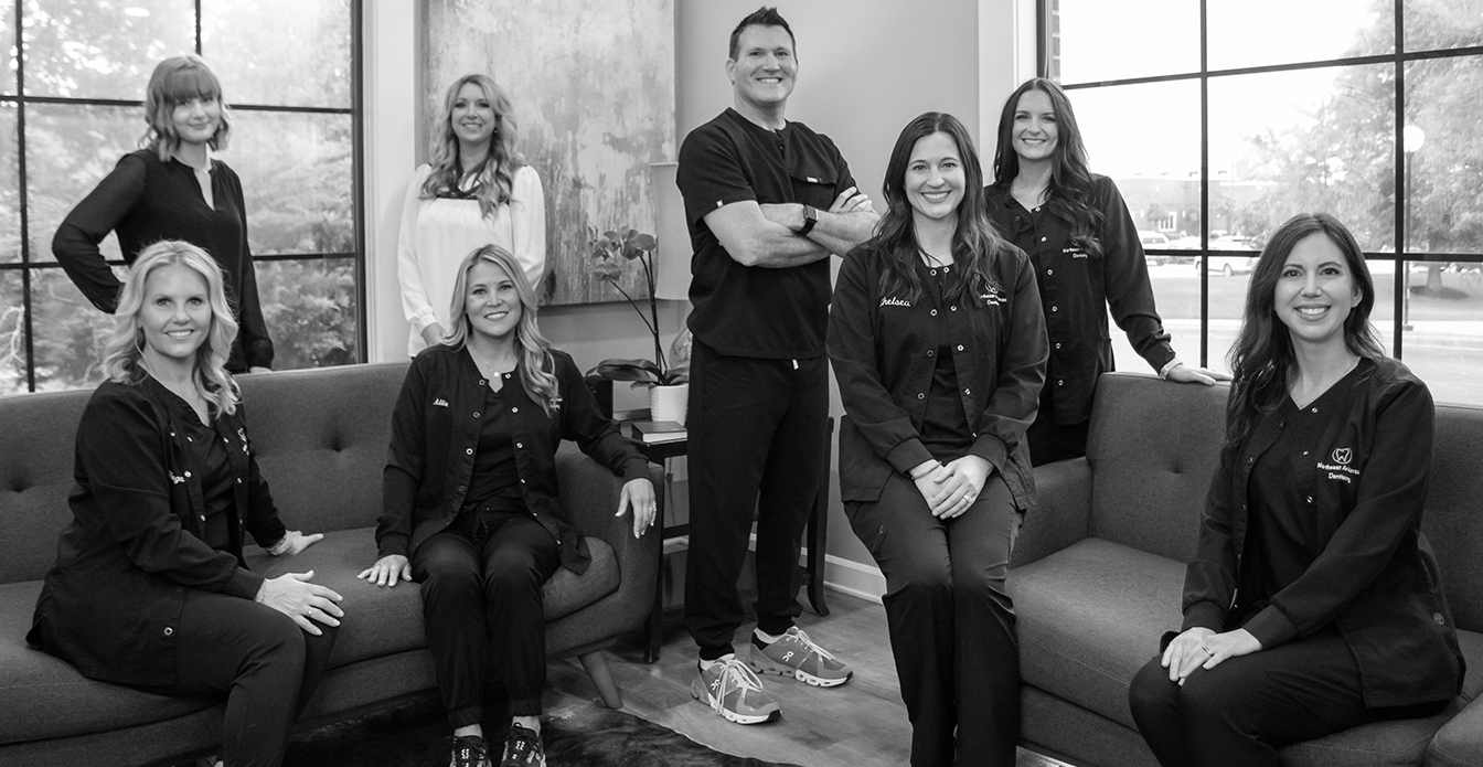 Smiling Jonesboro dentist and team members at Northeast Arkansas Dentistry