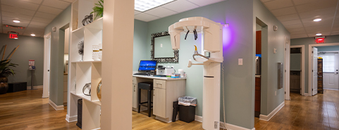 Dental patient getting a cone beam scan of his mouth and jaw